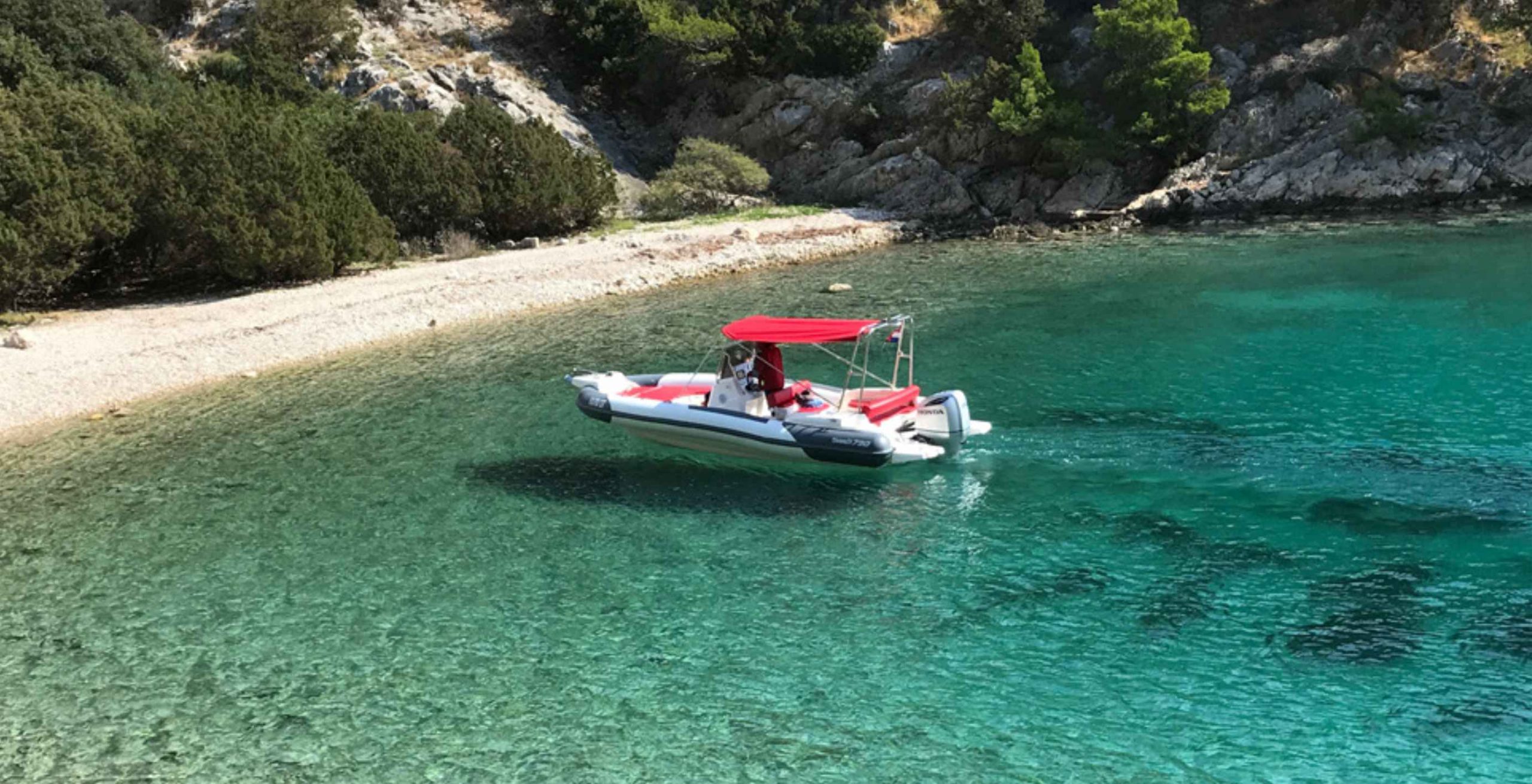 Our boat anchored in a quiet bay