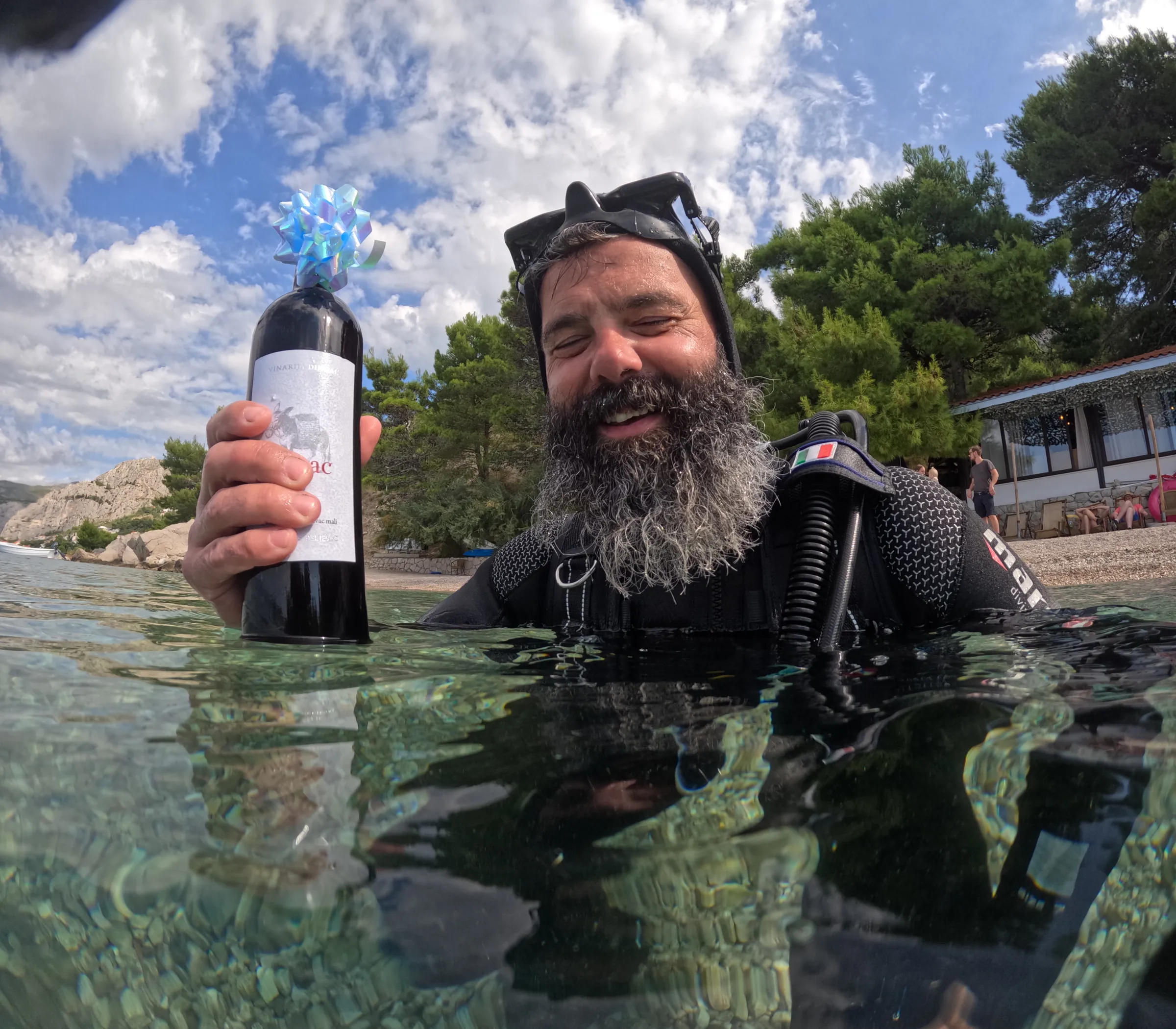 Dive instructor smiling in the water