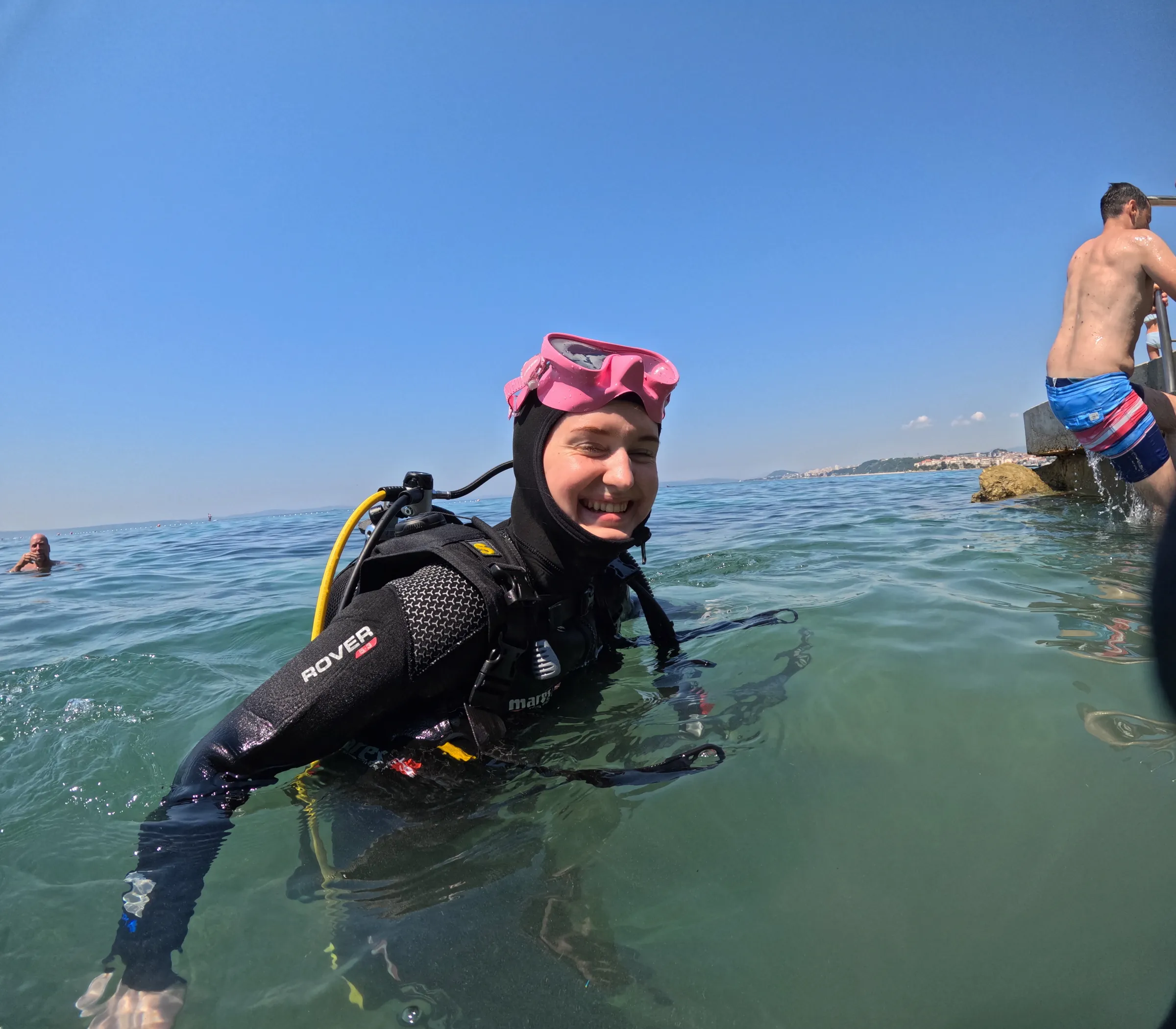 Smiling diver after her first dive
